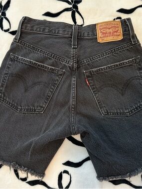 Levi's Washed Black Denim Shorts with Raw Hem